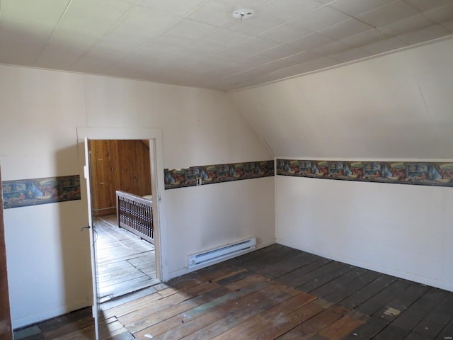204 E Wayne St, Ironton, MO 63650 - bonus room featuring a baseboard heating unit, vaulted ceiling, and hardwood / wood-style floors
