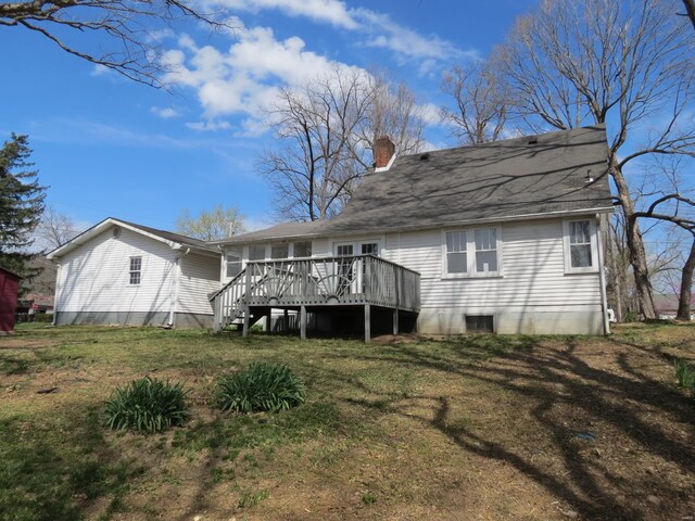 204 E Wayne St, Ironton, MO 63650 - rear view of house featuring a chimney, a deck, a yard, and stairs