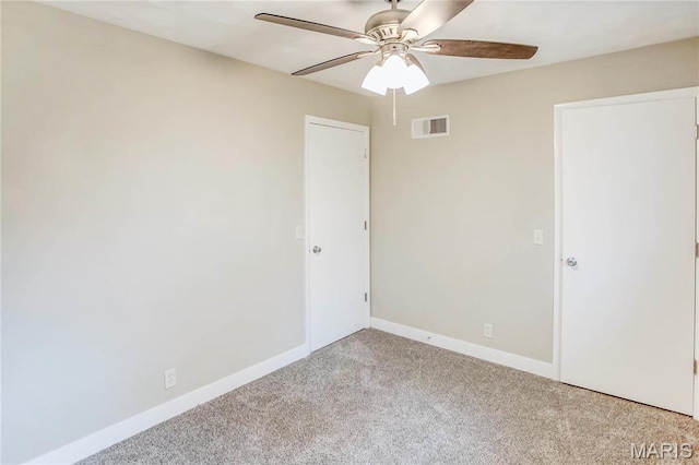 23388 Glenda Ave, Jerseyville, IL 62052 - spare room featuring ceiling fan and light carpet