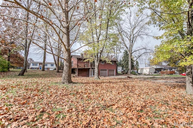 23388 Glenda Ave, Jerseyville, IL 62052 - view of yard with a garage and a wooden deck