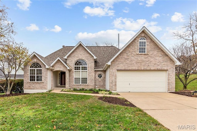 3918 White Rose Ln, Saint Charles, MO 63304 - traditional-style home with brick siding, driveway, and a front lawn