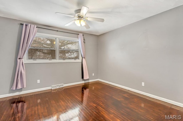 803 Fairview Dr, Washington, MO 63090 - empty room with baseboards, a ceiling fan, and hardwood / wood-style floors