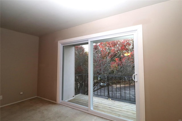 1049 Lafayette Unit D, Collinsville, IL 62234 - doorway to outside with carpet floors and baseboards