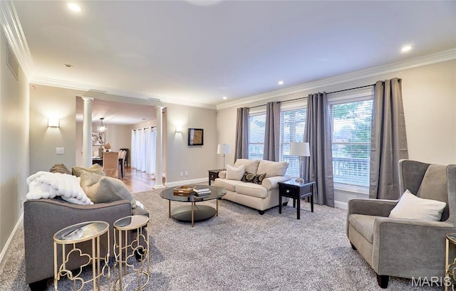 carpeted living room featuring ornate columns, baseboards, ornamental molding, and recessed lighting