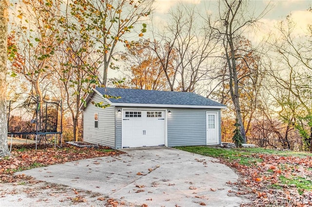 121 Douglas Dr, Pleasant Hill, IL 62366 - garage with a trampoline and driveway