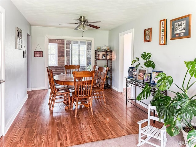 121 Douglas Dr, Pleasant Hill, IL 62366 - dining space featuring ceiling fan, wood finished floors, and baseboards