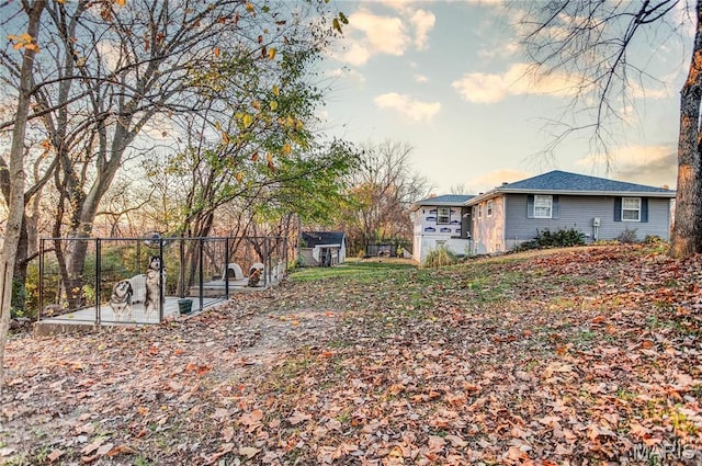 121 Douglas Dr, Pleasant Hill, IL 62366 - view of yard featuring an outbuilding, a patio area, and fence