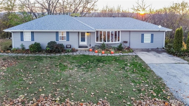 121 Douglas Dr, Pleasant Hill, IL 62366 - ranch-style house with a front lawn, driveway, and roof with shingles