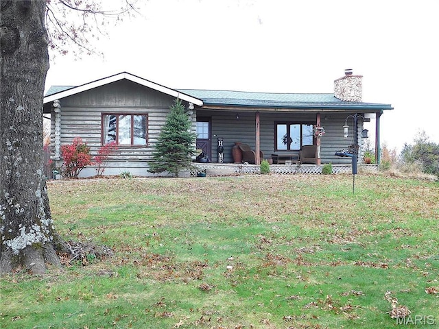 5 Sherwood Meadows Cir, Marthasville, MO 63357 - view of front of home featuring a chimney, a front lawn, a porch, and log exterior