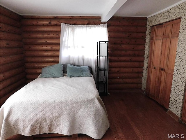 5 Sherwood Meadows Cir, Marthasville, MO 63357 - bedroom with dark wood-style floors, wallpapered walls, beam ceiling, and log walls