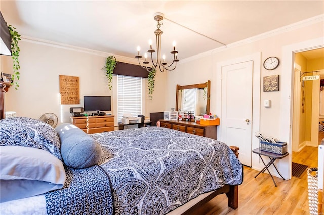 1040 N Kingshighway, Sikeston, MO 63801 - bedroom with a chandelier, ornamental molding, and light wood-style flooring