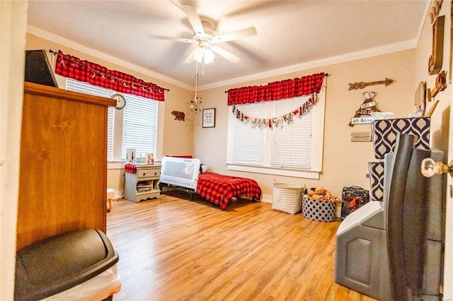 1040 N Kingshighway, Sikeston, MO 63801 - bedroom featuring light wood-style floors, ornamental molding, and ceiling fan