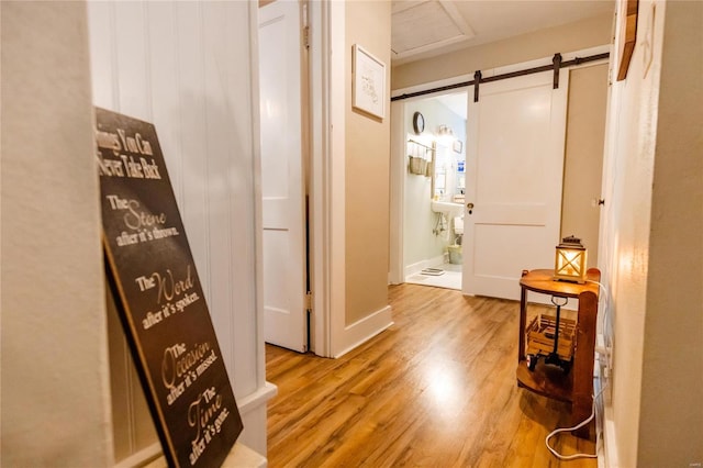 1040 N Kingshighway, Sikeston, MO 63801 - hall with wood finished floors and a barn door