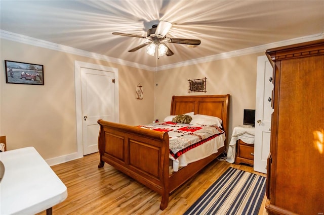 1040 N Kingshighway, Sikeston, MO 63801 - bedroom featuring light wood-style flooring, ornamental molding, ceiling fan, and baseboards