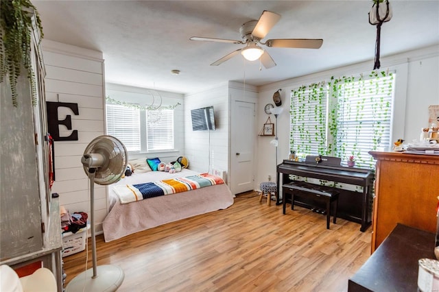 1040 N Kingshighway, Sikeston, MO 63801 - bedroom featuring light wood-type flooring and ceiling fan