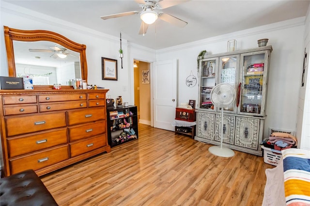 1040 N Kingshighway, Sikeston, MO 63801 - sitting room featuring ceiling fan, light wood finished floors, and ornamental molding