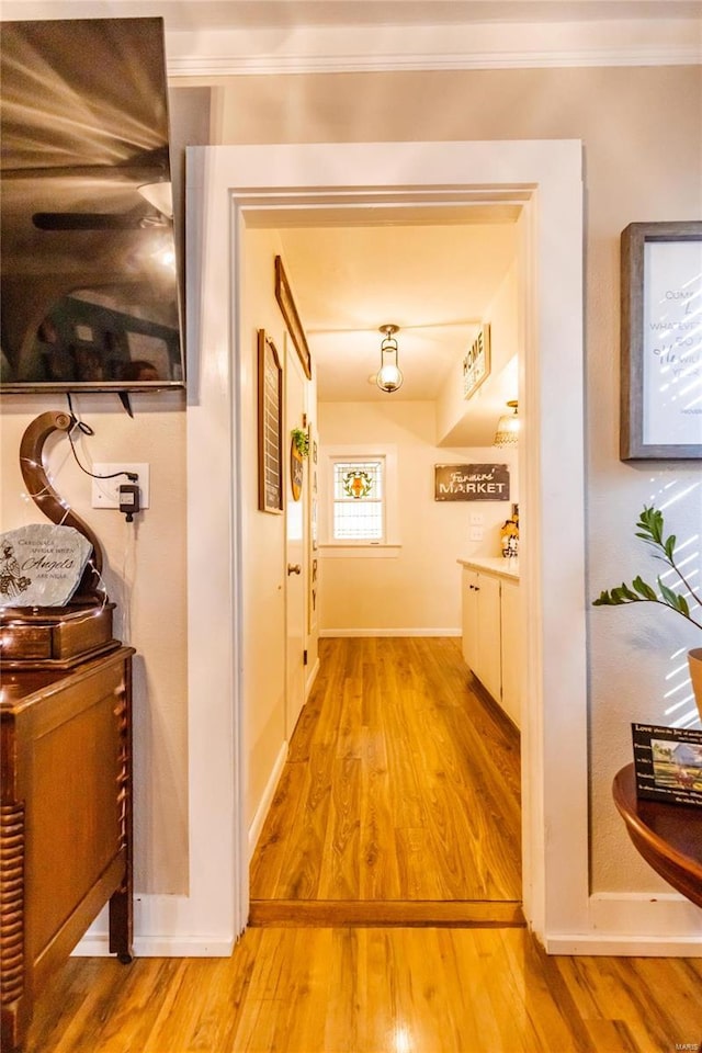 1040 N Kingshighway, Sikeston, MO 63801 - hallway with light wood finished floors, ornamental molding, and baseboards