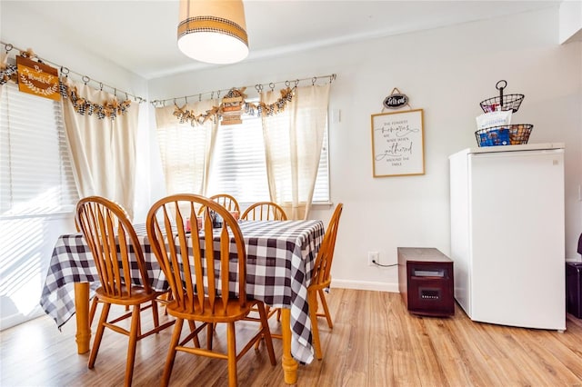 1040 N Kingshighway, Sikeston, MO 63801 - dining area featuring light wood finished floors and baseboards