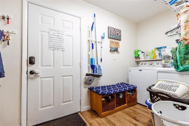 1040 N Kingshighway, Sikeston, MO 63801 - mudroom featuring wood finished floors and separate washer and dryer