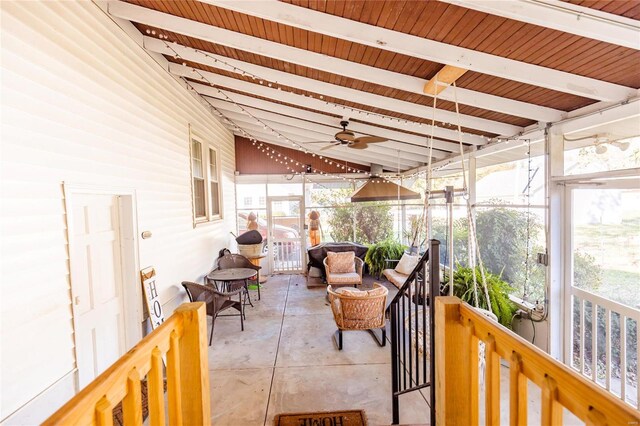 1040 N Kingshighway, Sikeston, MO 63801 - sunroom / solarium with beamed ceiling and a ceiling fan