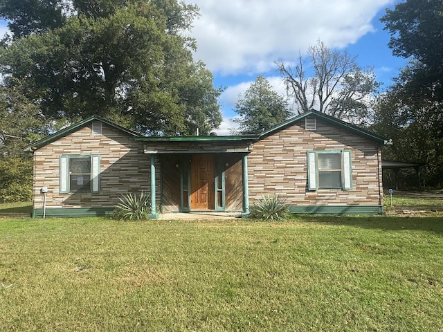 206 Chance St, Kennett, MO 63857 - rear view of house with a yard