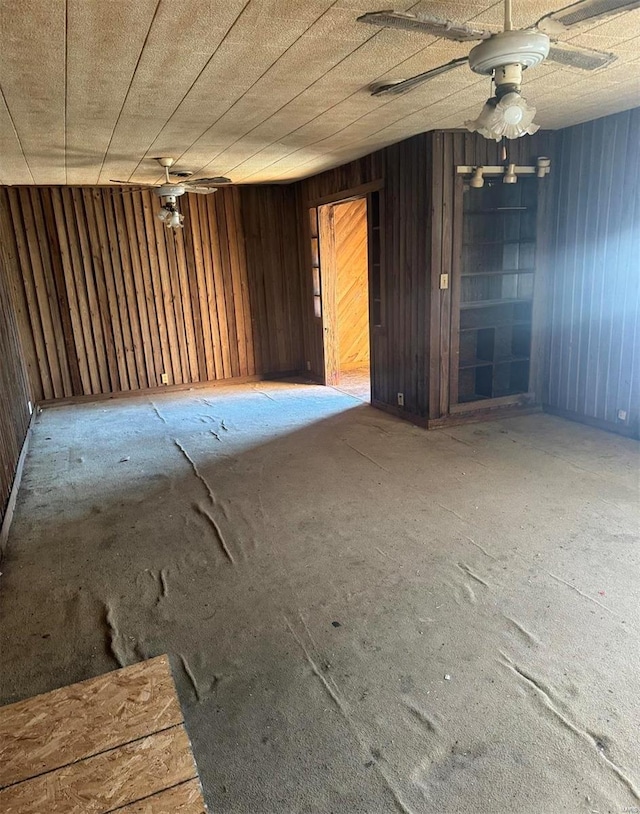206 Chance St, Kennett, MO 63857 - unfurnished room featuring ceiling fan and wood walls