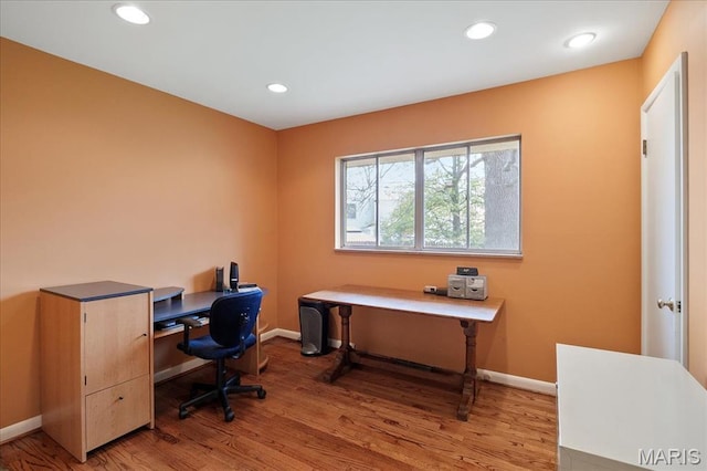 office with light wood-style flooring, baseboards, and recessed lighting