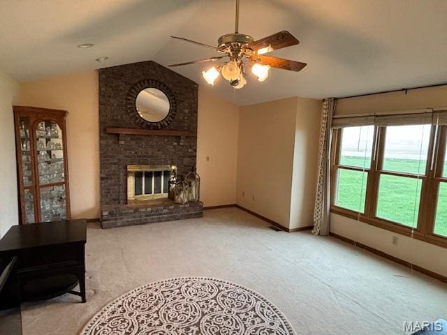 15020 Jamestown Rd, Breese, IL 62230 - unfurnished living room with carpet, lofted ceiling, ceiling fan, baseboards, and a fireplace