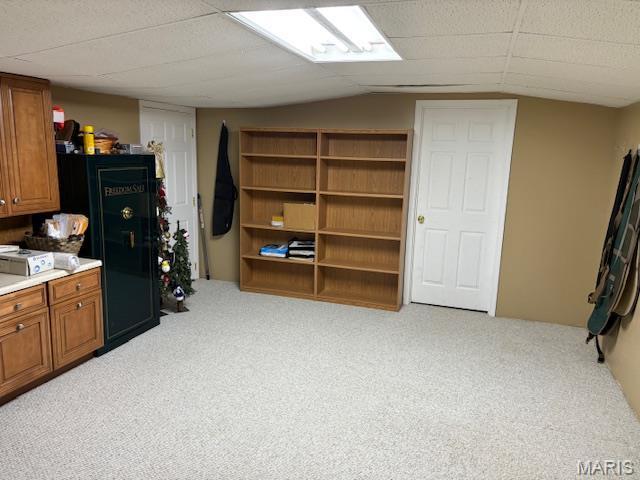15020 Jamestown Rd, Breese, IL 62230 - kitchen with brown cabinetry, carpet floors, and light countertops