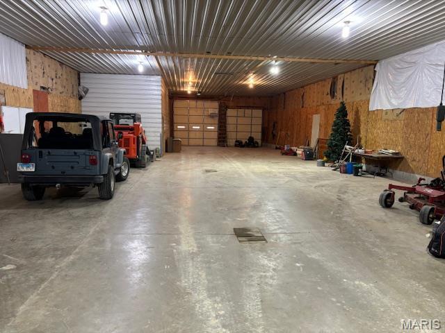 15020 Jamestown Rd, Breese, IL 62230 - garage featuring wood walls