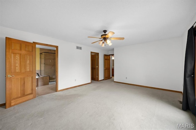 15020 Jamestown Rd, Breese, IL 62230 - unfurnished bedroom with light colored carpet, a ceiling fan, and ensuite bath