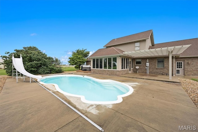 15020 Jamestown Rd, Breese, IL 62230 - swimming pool featuring a water slide, a patio area, and a pergola