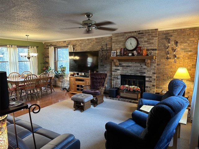 25 Whispering Oaks Dr, Washington, MO 63090 - living area with ceiling fan, a textured ceiling, a fireplace, brick wall, and a chandelier