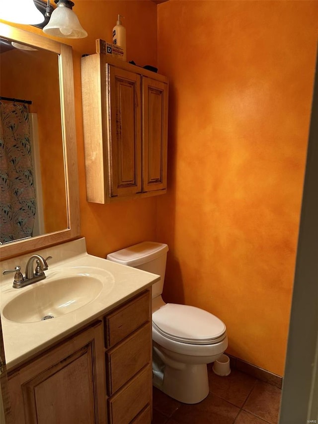 25 Whispering Oaks Dr, Washington, MO 63090 - bathroom with tile patterned flooring, toilet, vanity, and a shower with shower curtain