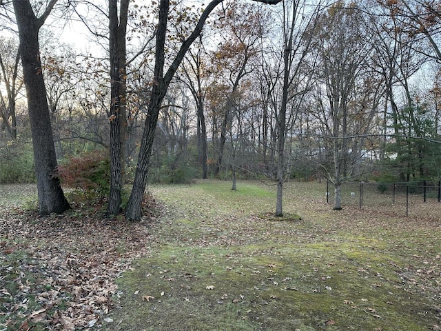 25 Whispering Oaks Dr, Washington, MO 63090 - view of yard with fence and a view of trees