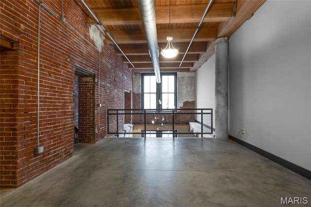 1113 Washington Ave Unit 215, Saint Louis, MO 63101 - below grade area with brick wall and baseboards
