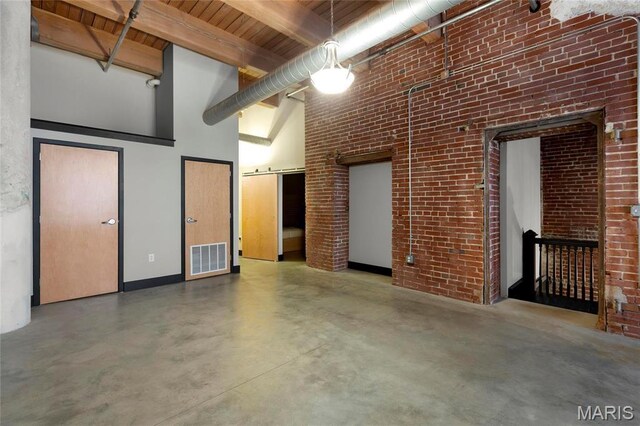 1113 Washington Ave Unit 215, Saint Louis, MO 63101 - garage featuring wooden ceiling and baseboards