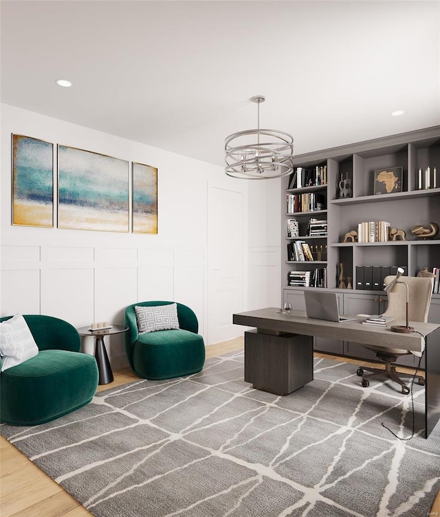 1136 Weidman Rd, Town And Country, MO 63017 - sitting room with a chandelier, wood finished floors, a decorative wall, recessed lighting, and an office area