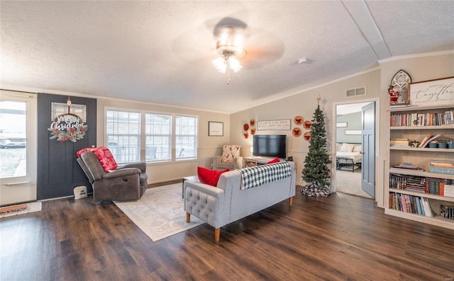 704 Ogle Dr, Richland, MO 65556 - living room featuring a textured ceiling, wood finished floors, lofted ceiling, crown molding, and ceiling fan