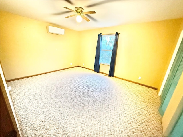 2560 Birch St, Doe Run, MO 63637 - unfurnished room with a ceiling fan, a wall mounted air conditioner, baseboards, and carpet flooring