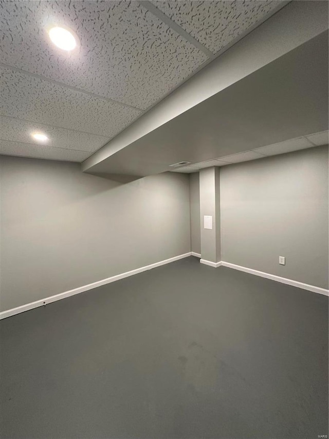 926 Justice Ct, Florissant, MO 63034 - finished basement featuring baseboards and a drop ceiling