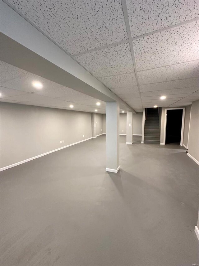 926 Justice Ct, Florissant, MO 63034 - finished basement with a paneled ceiling, baseboards, recessed lighting, and stairs