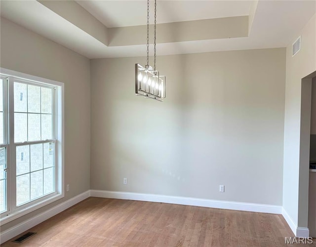 1905 Wheelwright Dr, Cape Girardeau, MO 63701 - empty room featuring baseboards, plenty of natural light, and light wood-type flooring
