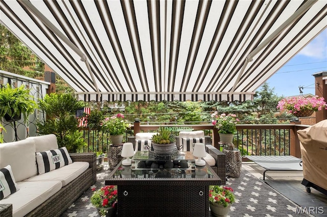 balcony with outdoor dining area and an outdoor hangout area