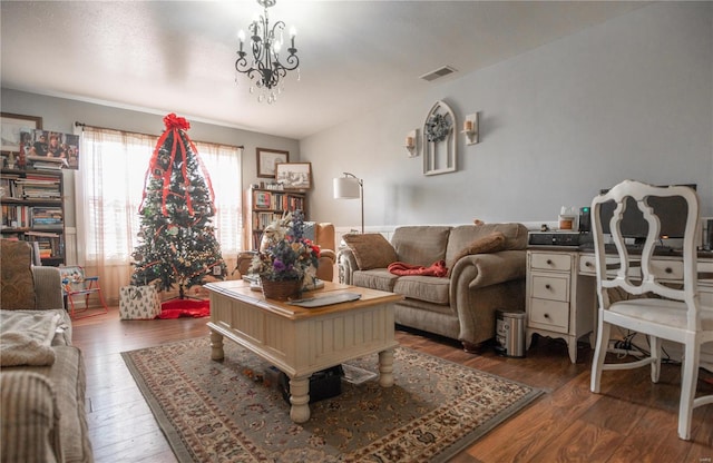 203 Borth St, Doniphan, MO 63935 - living area with hardwood / wood-style flooring and a chandelier