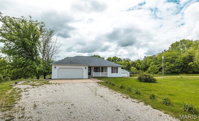 14280 County Road 8100, Rolla, MO 65401 - view of front of property with gravel driveway, a garage, and a front yard