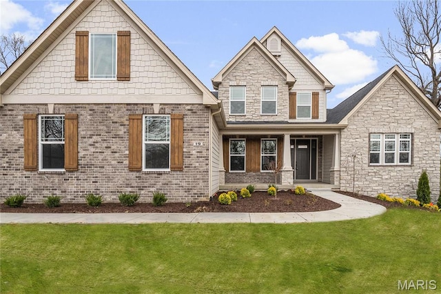 19 Beaver Dr, Creve Coeur, MO 63141 - craftsman inspired home with a front lawn, covered porch, and stone siding
