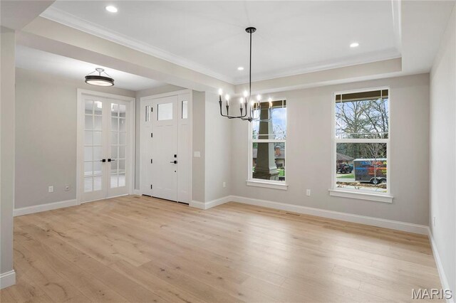 19 Beaver Dr, Creve Coeur, MO 63141 - unfurnished dining area with a chandelier, light wood-type flooring, ornamental molding, baseboards, and recessed lighting