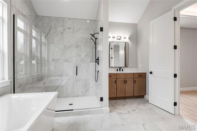 19 Beaver Dr, Creve Coeur, MO 63141 - bathroom with a marble finish shower, marble finish flooring, a freestanding tub, vanity, and baseboards