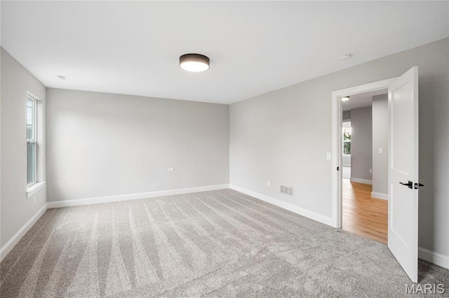 19 Beaver Dr, Creve Coeur, MO 63141 - carpeted spare room featuring baseboards and a smoke detector